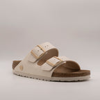 Birkenstock Arizona Rivet Logo vegan sandali eggshell - scarpe di qualità venduta a Milano da Pli-Pla