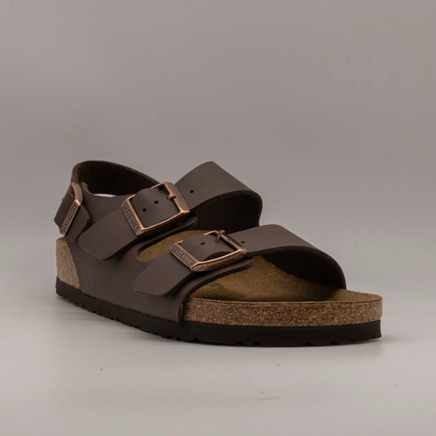 Birkenstock Milano – sandalo con cinturino alla caviglia e plantare anatomico - dark brown - scarpe di qualità venduta a Milano da Pli-Pla