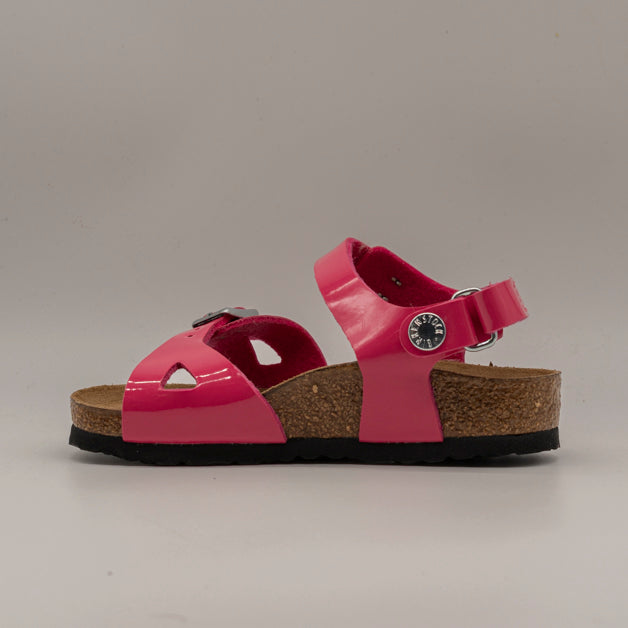 Birkenstock Rio Kids – sandalo bambina con cinturino al tallone e plantare anatomico - patent fuchsia tulip - scarpe di qualità venduta a Milano da Pli-Pla